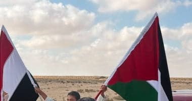 علم فلسطين يظهر في احتفالية استقبال بعثة منتخب مصر بالعلمين
